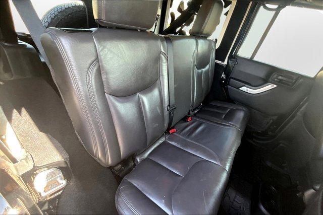 used 2014 Jeep Wrangler Unlimited car, priced at $13,395