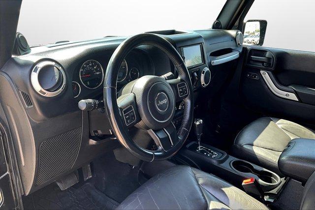 used 2014 Jeep Wrangler Unlimited car, priced at $13,395