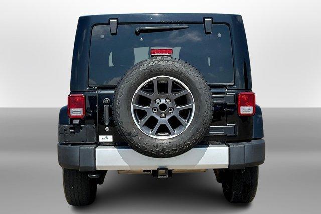 used 2014 Jeep Wrangler Unlimited car, priced at $13,395