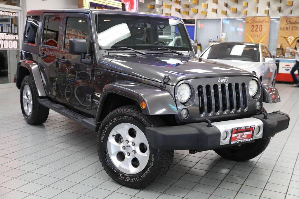 used 2014 Jeep Wrangler Unlimited car, priced at $13,896