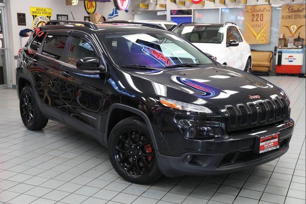 used 2014 Jeep Cherokee car, priced at $12,896