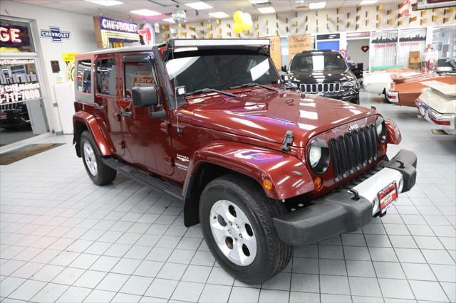 used 2009 Jeep Wrangler Unlimited car, priced at $10,896
