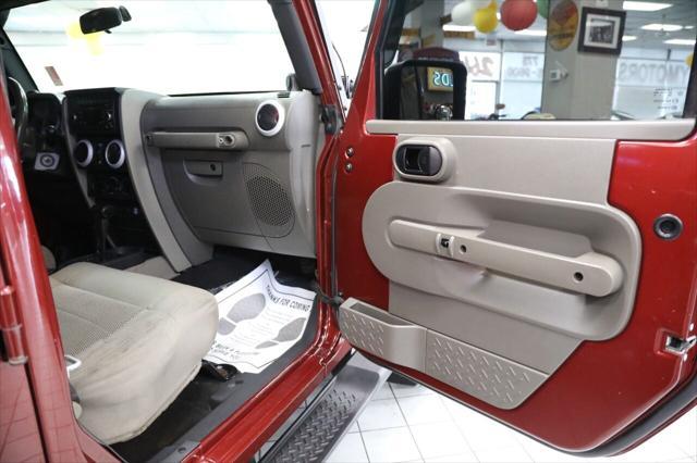 used 2009 Jeep Wrangler Unlimited car, priced at $10,896