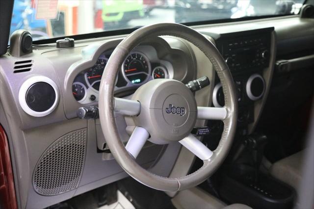 used 2009 Jeep Wrangler Unlimited car, priced at $10,896