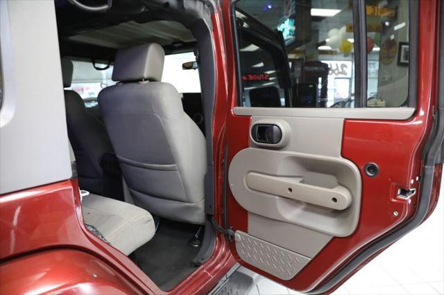 used 2009 Jeep Wrangler Unlimited car, priced at $10,896