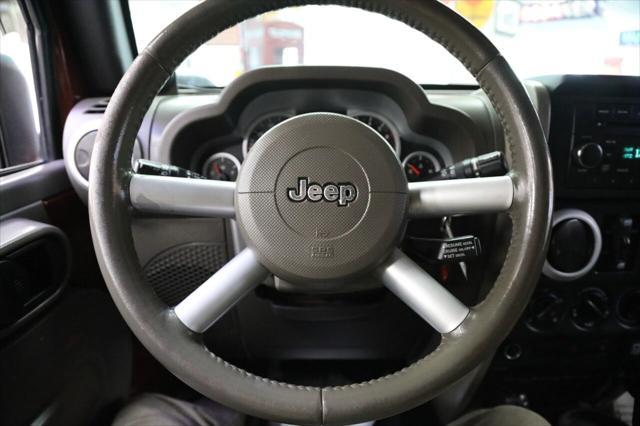used 2009 Jeep Wrangler Unlimited car, priced at $10,896