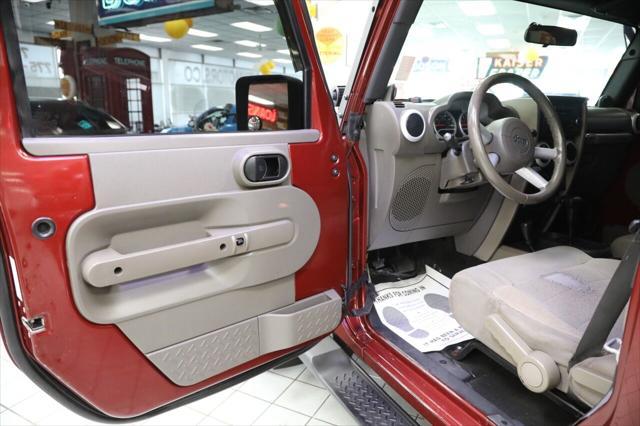 used 2009 Jeep Wrangler Unlimited car, priced at $10,896