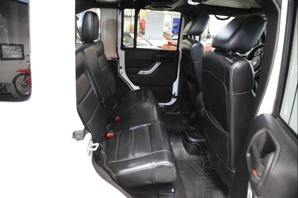 used 2012 Jeep Wrangler Unlimited car, priced at $14,896