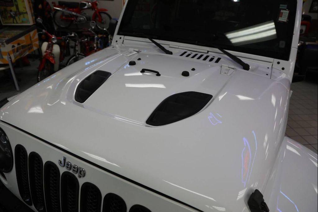 used 2012 Jeep Wrangler Unlimited car, priced at $14,896