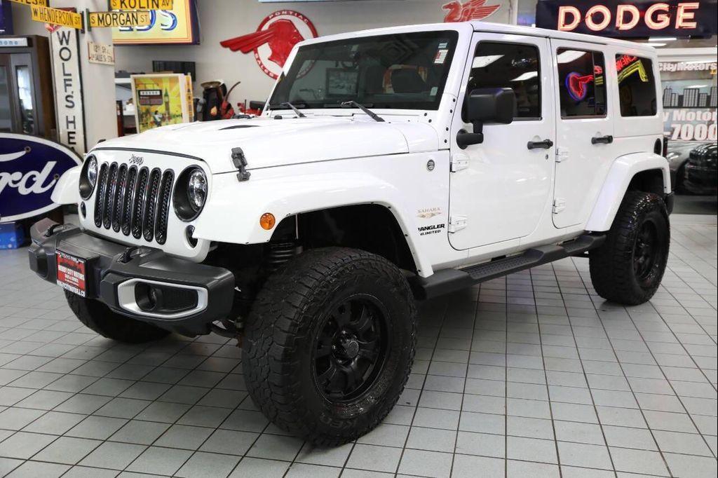 used 2012 Jeep Wrangler Unlimited car, priced at $14,896