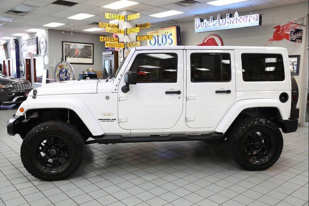 used 2012 Jeep Wrangler Unlimited car, priced at $14,896