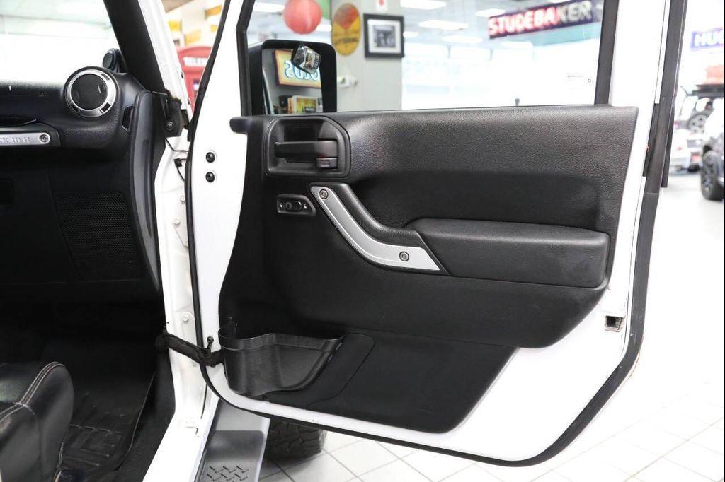 used 2012 Jeep Wrangler Unlimited car, priced at $14,896
