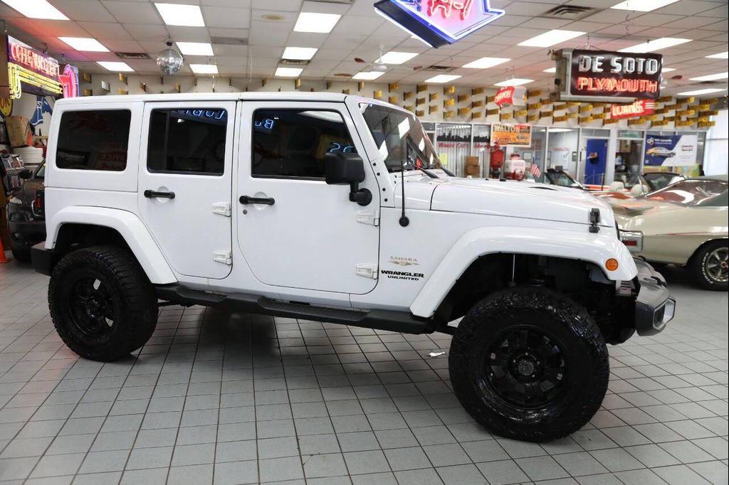 used 2012 Jeep Wrangler Unlimited car, priced at $14,896