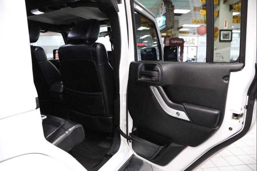 used 2012 Jeep Wrangler Unlimited car, priced at $14,896