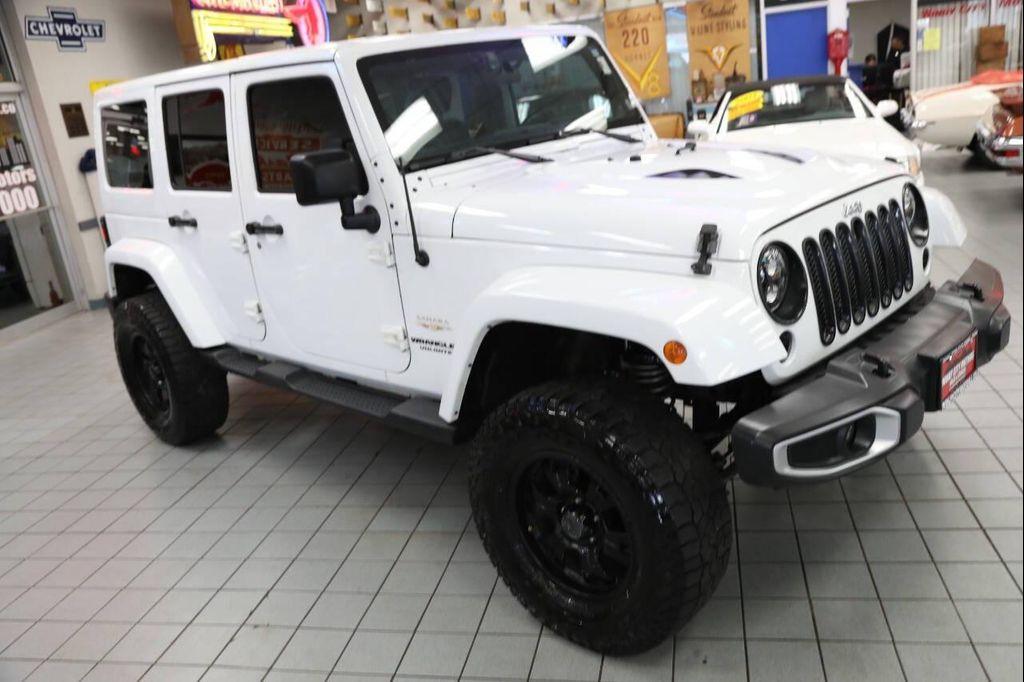 used 2012 Jeep Wrangler Unlimited car, priced at $14,896