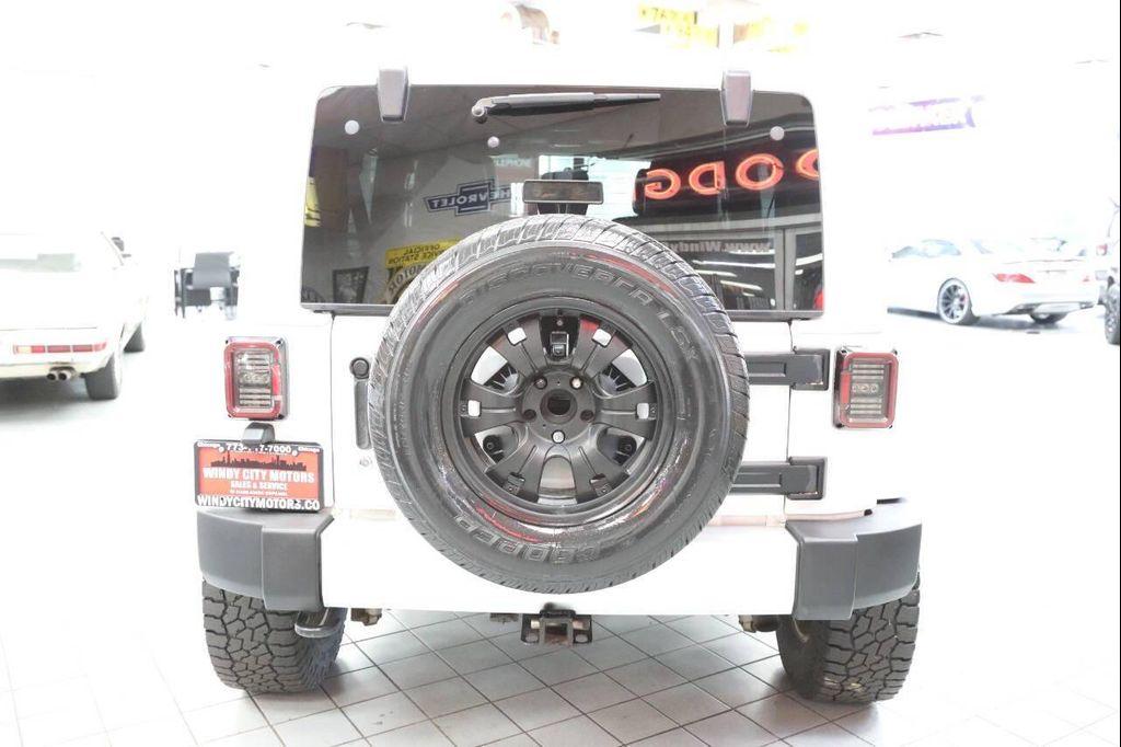 used 2012 Jeep Wrangler Unlimited car, priced at $14,896