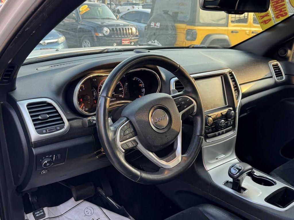 used 2015 Jeep Grand Cherokee car, priced at $15,896