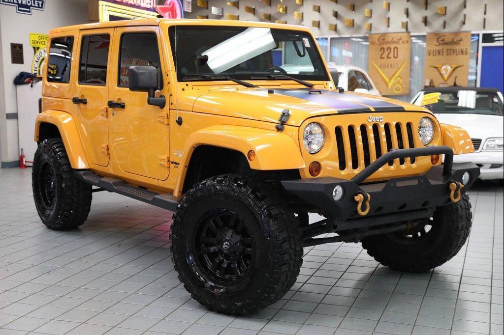 used 2012 Jeep Wrangler Unlimited car, priced at $18,896