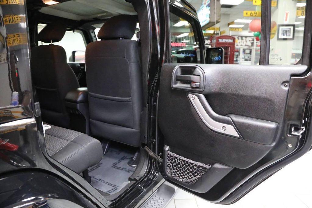 used 2012 Jeep Wrangler Unlimited car, priced at $13,896