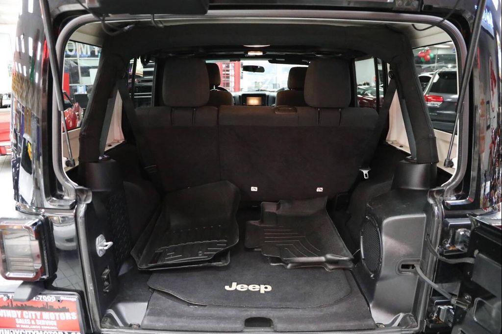 used 2012 Jeep Wrangler Unlimited car, priced at $13,896