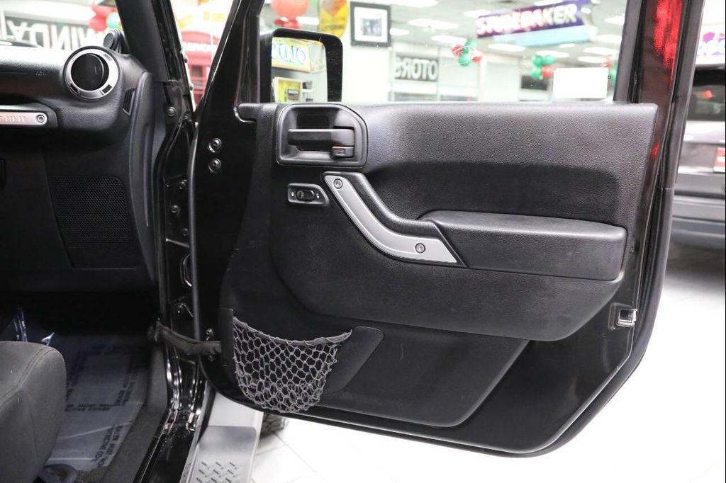 used 2012 Jeep Wrangler Unlimited car, priced at $13,896