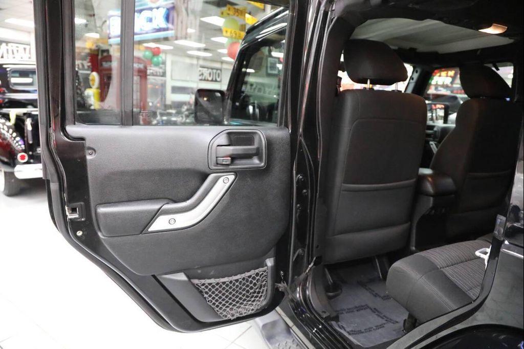 used 2012 Jeep Wrangler Unlimited car, priced at $13,896