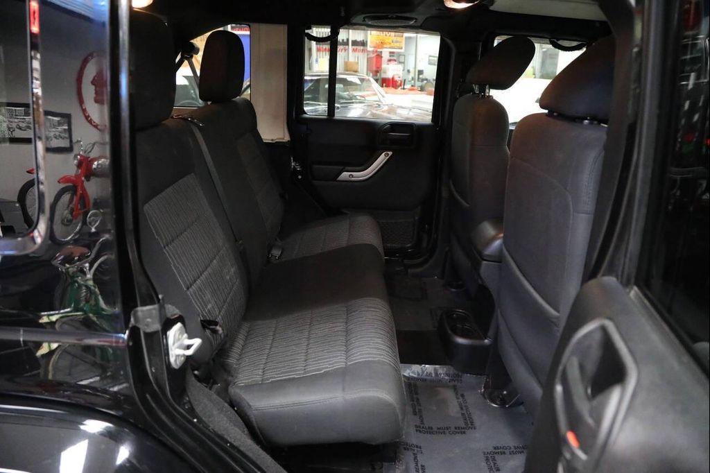 used 2012 Jeep Wrangler Unlimited car, priced at $13,896