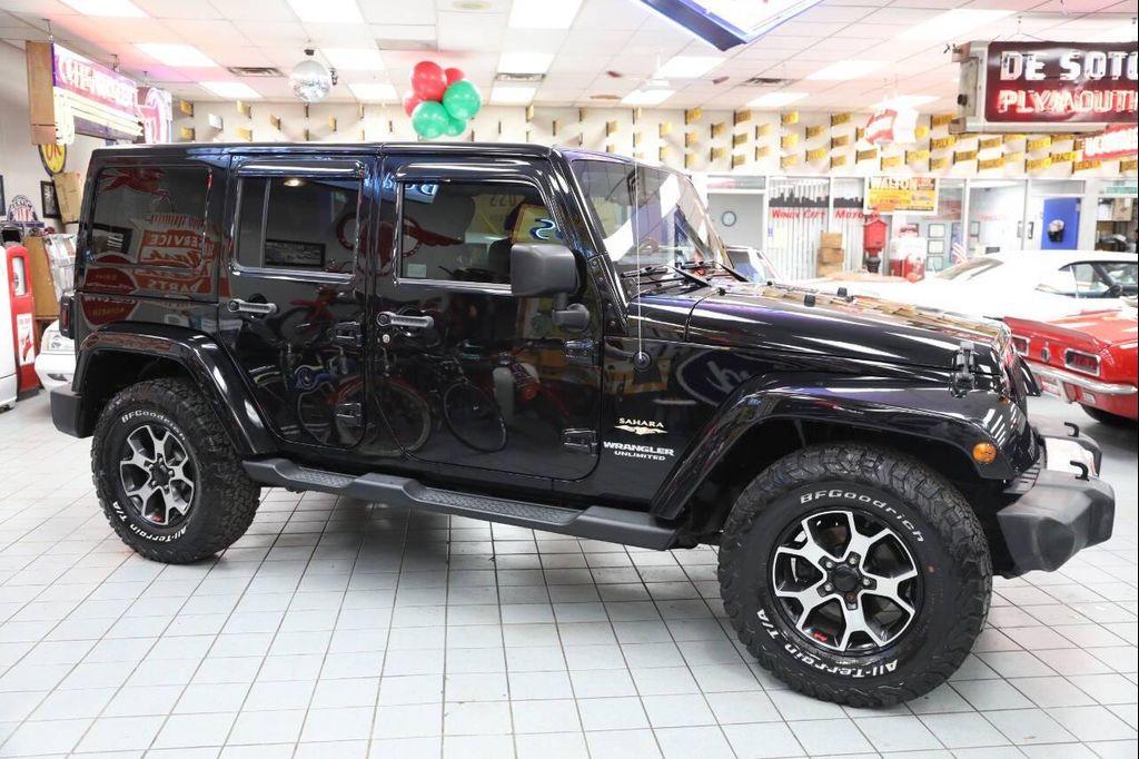 used 2012 Jeep Wrangler Unlimited car, priced at $13,896