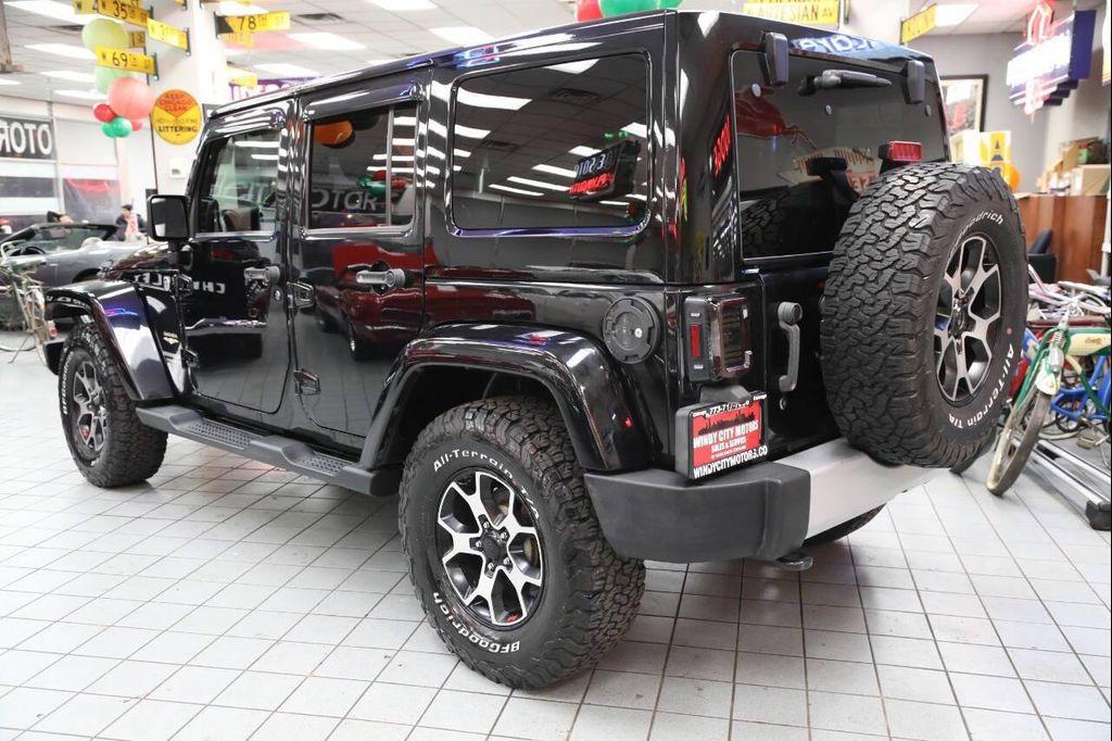 used 2012 Jeep Wrangler Unlimited car, priced at $13,896