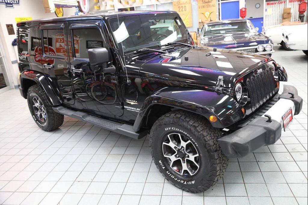 used 2012 Jeep Wrangler Unlimited car, priced at $13,896