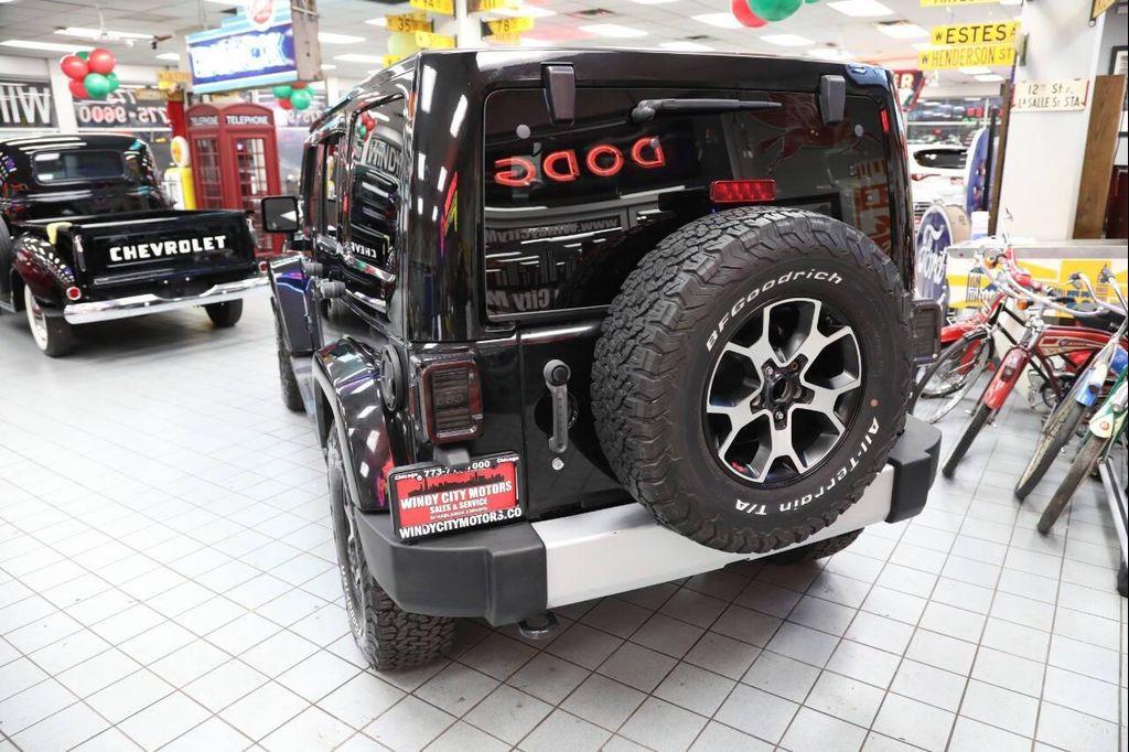 used 2012 Jeep Wrangler Unlimited car, priced at $13,896