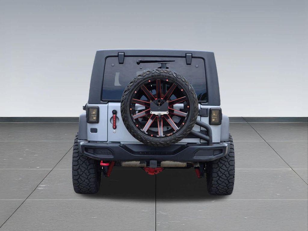 used 2016 Jeep Wrangler Unlimited car, priced at $23,540