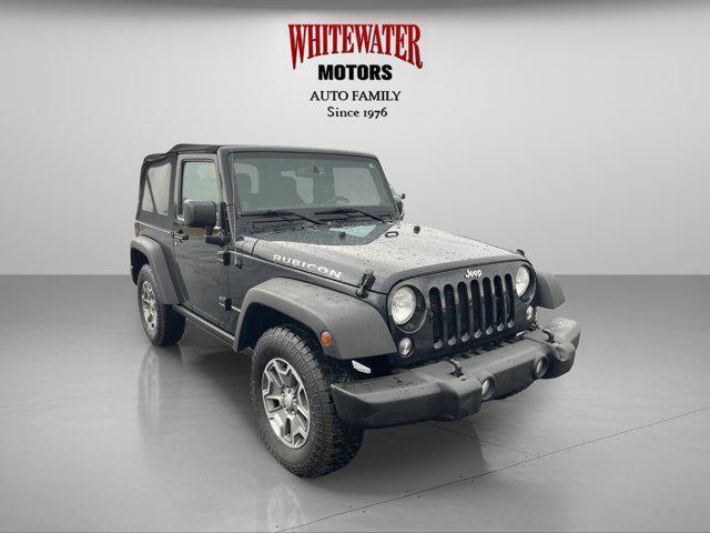 used 2014 Jeep Wrangler car, priced at $13,988