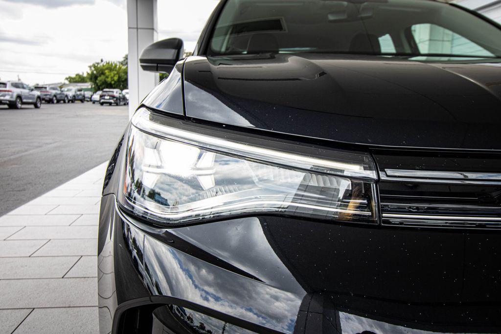 used 2025 Volkswagen Taos car, priced at $23,712