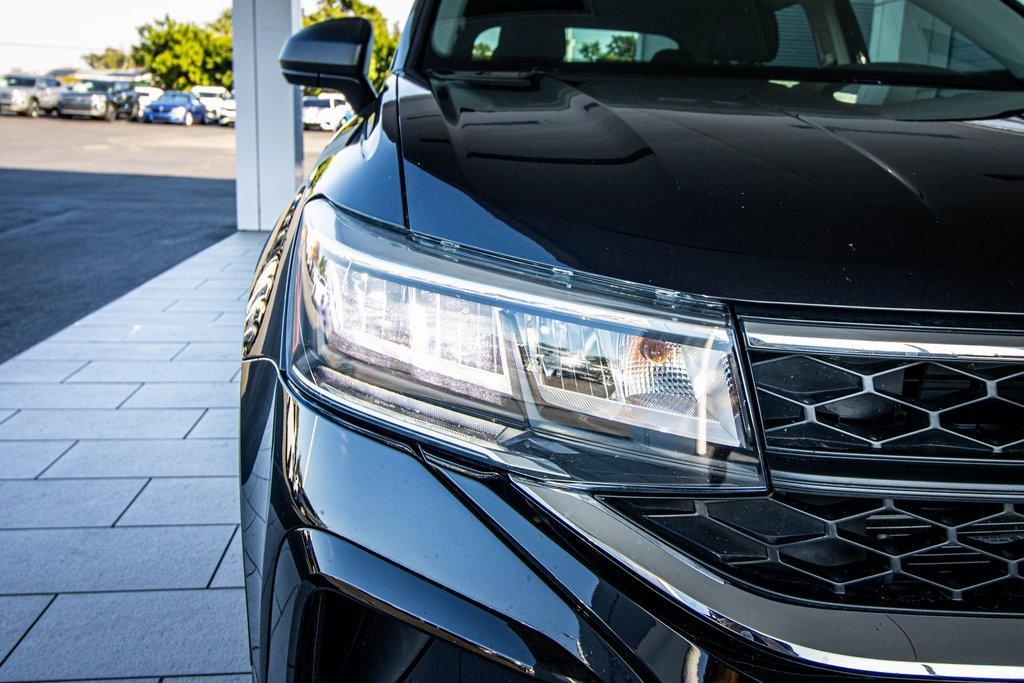 used 2023 Volkswagen Taos car, priced at $17,597