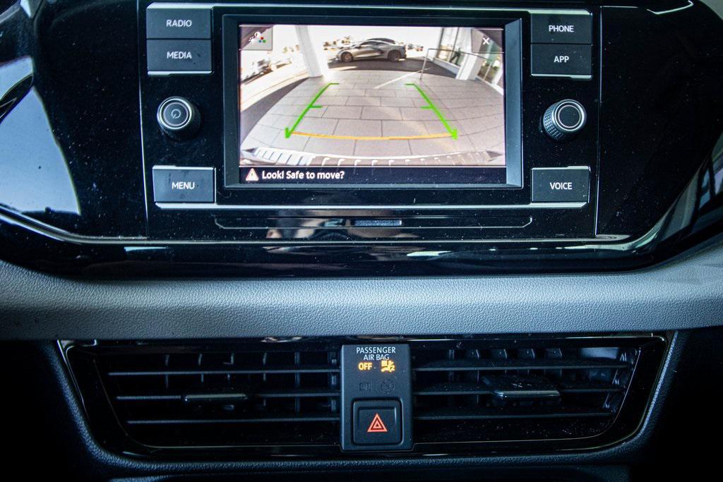 used 2023 Volkswagen Taos car, priced at $17,597