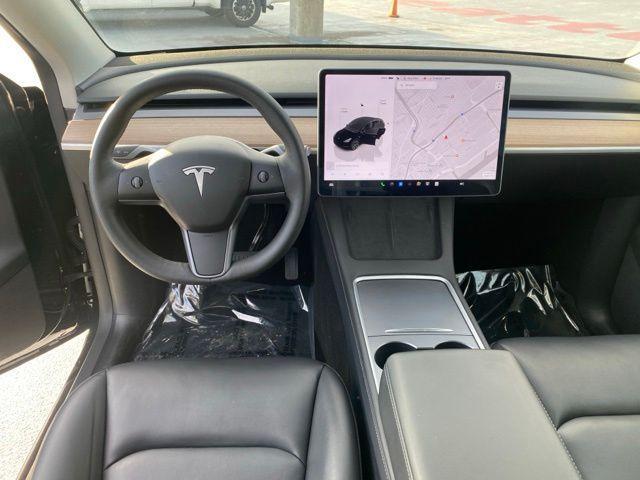 used 2025 Tesla Model Y car, priced at $32,988