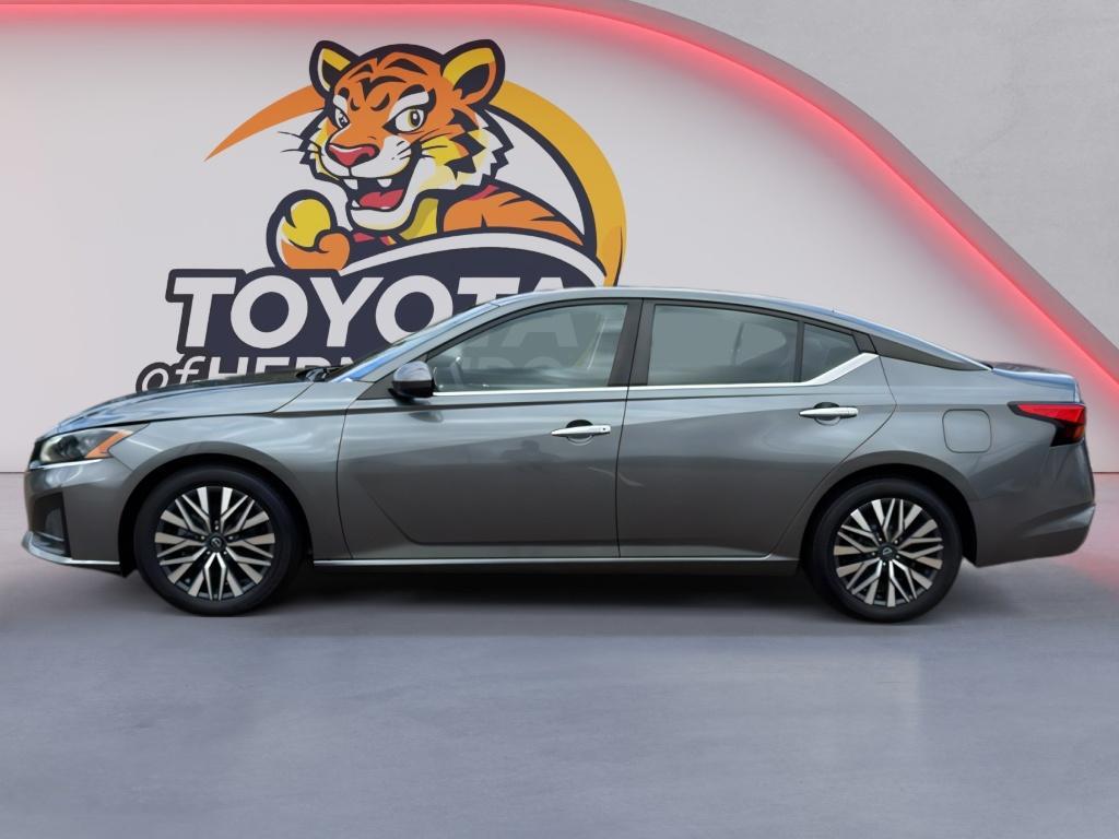 used 2023 Nissan Altima car, priced at $13,000
