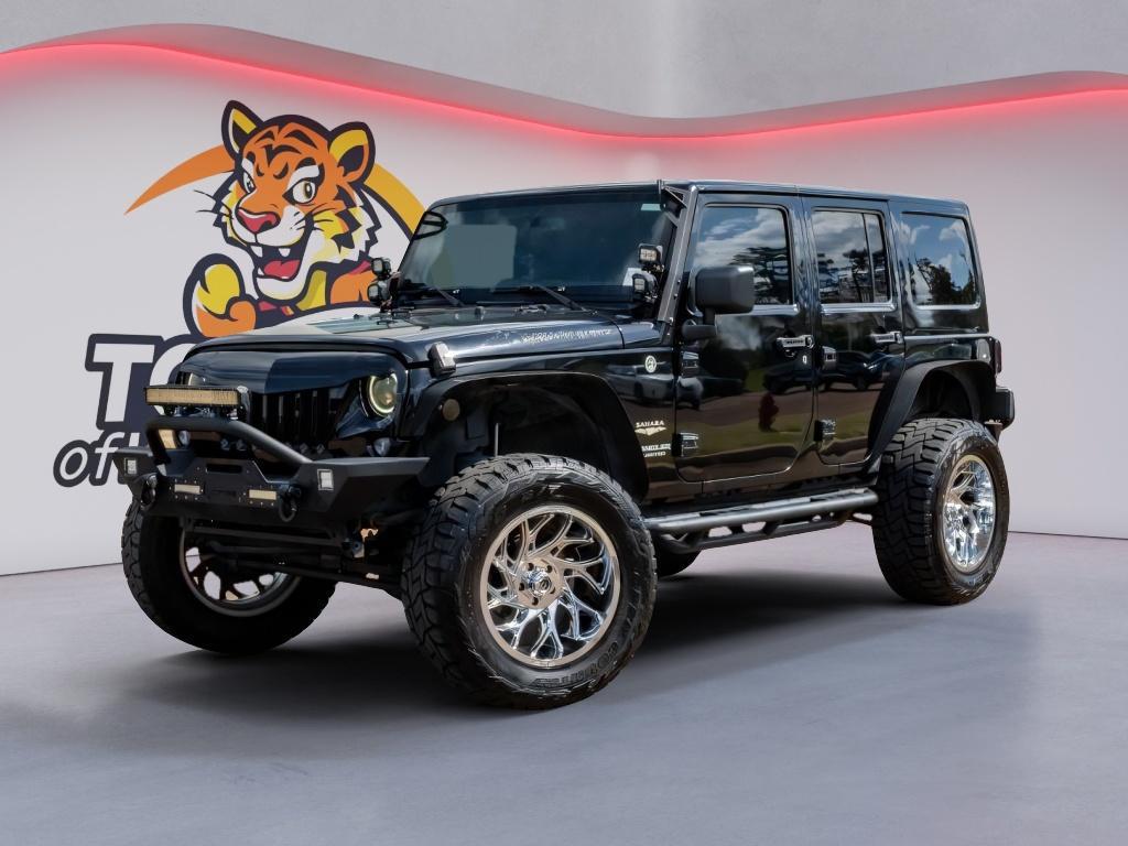 used 2014 Jeep Wrangler Unlimited car, priced at $19,141