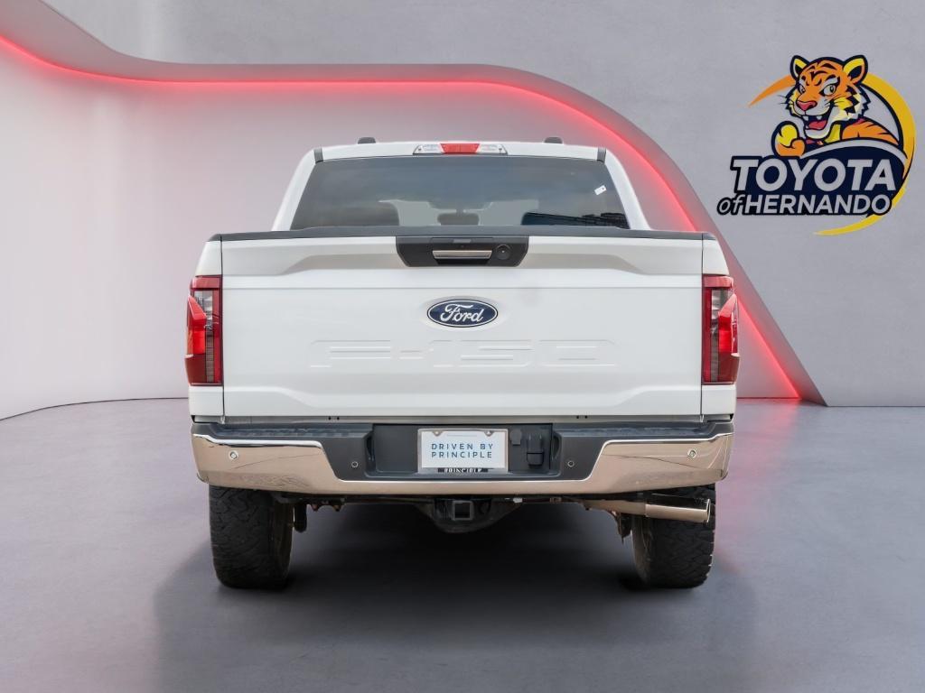 used 2024 Ford F-150 car, priced at $39,559