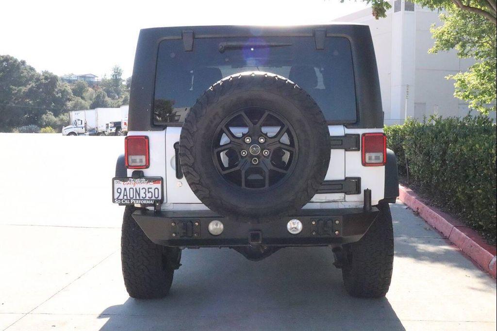 used 2014 Jeep Wrangler car, priced at $13,995