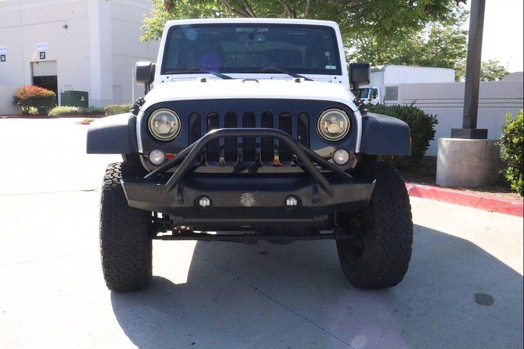 used 2014 Jeep Wrangler car, priced at $13,995