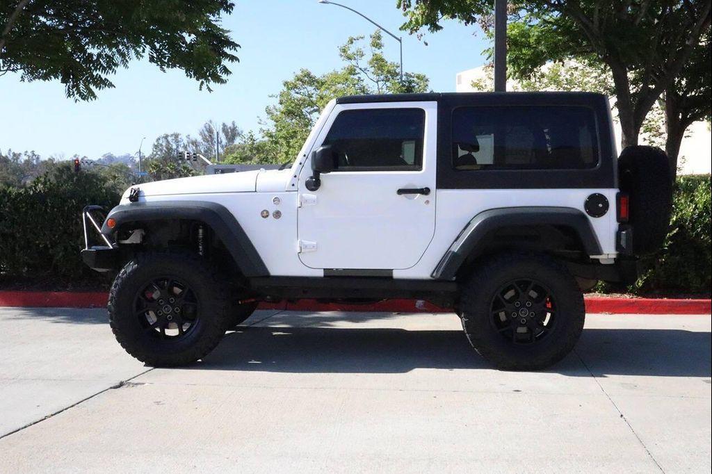 used 2014 Jeep Wrangler car, priced at $13,995