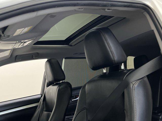 used 2019 Toyota Highlander Hybrid car, priced at $23,278