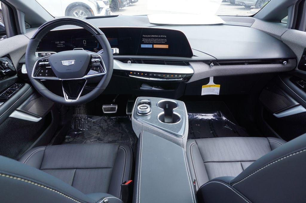 new 2025 Cadillac OPTIQ car, priced at $58,170