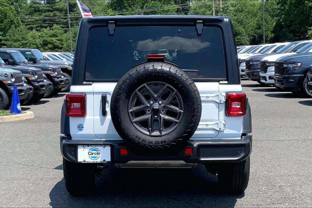 used 2024 Jeep Wrangler car, priced at $34,276