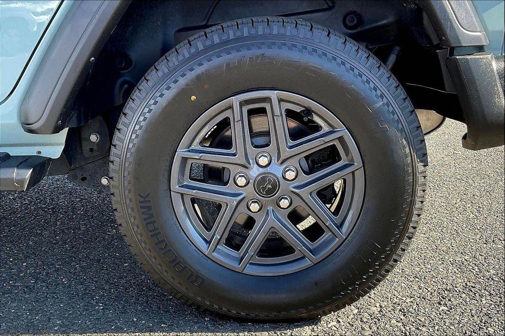 used 2024 Jeep Wrangler car, priced at $33,883