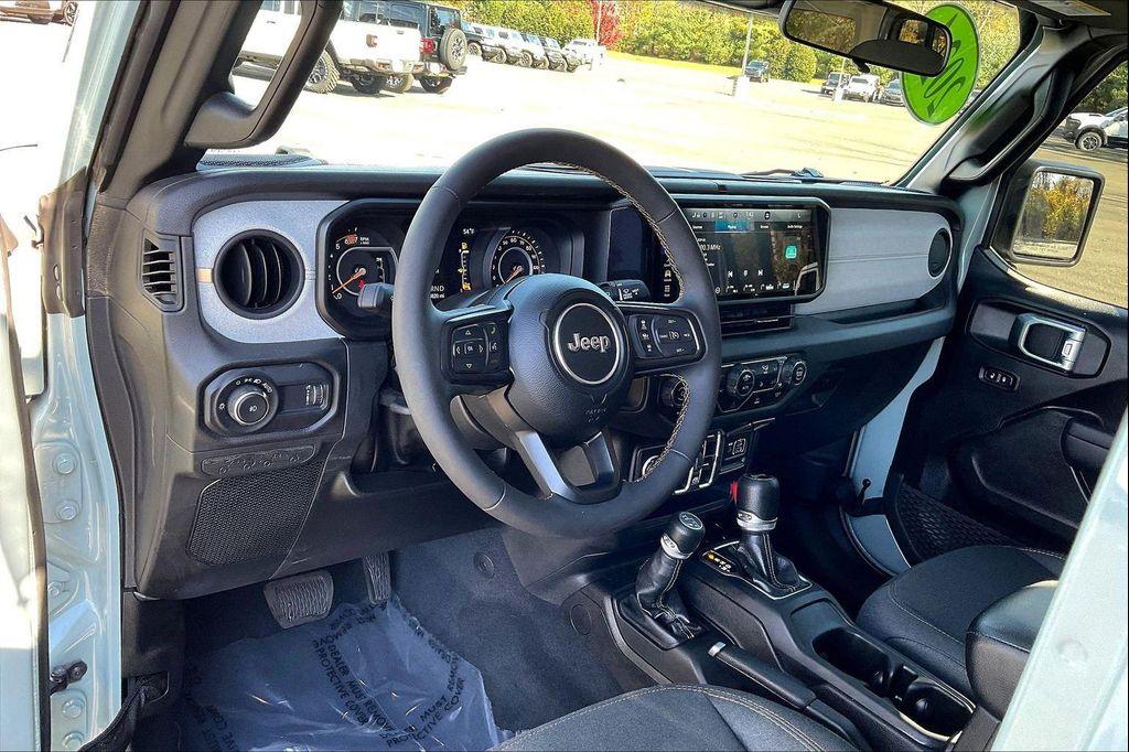 used 2024 Jeep Wrangler car, priced at $33,883
