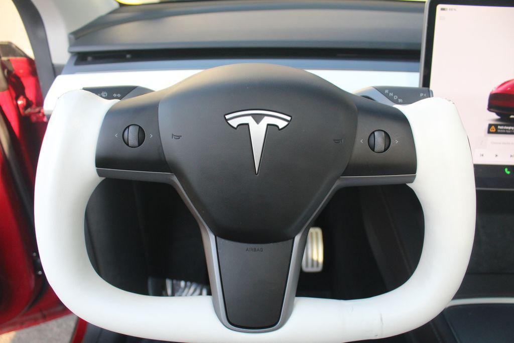 used 2025 Tesla Model Y car, priced at $41,994