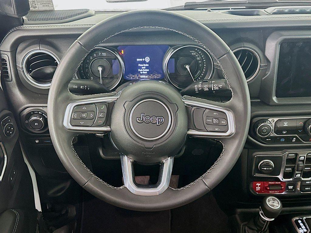 used 2023 Jeep Wrangler 4xe car, priced at $32,196